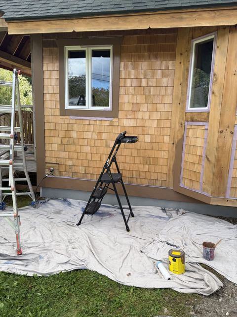 Cedar shingle wall with trim prepared for painting
