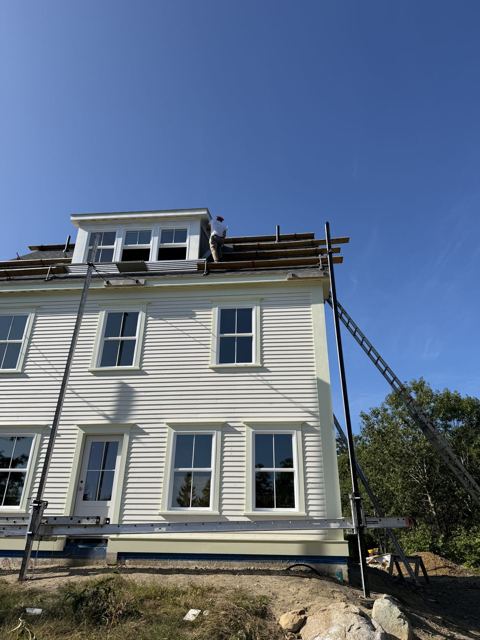 Freshly painted white house exterior